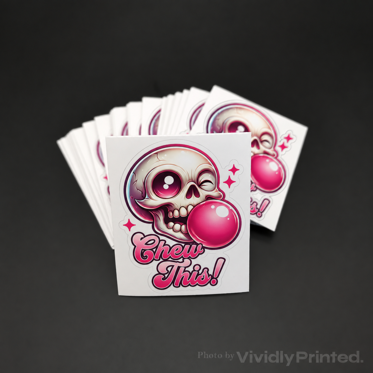 Individual kiss-cut stickers with a skull blowing pink bubble gum
