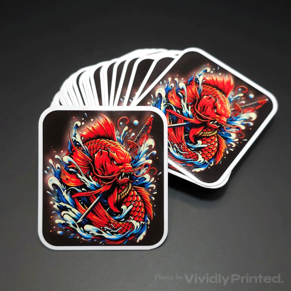 Square stickers with a red koi fish design and rounded corners