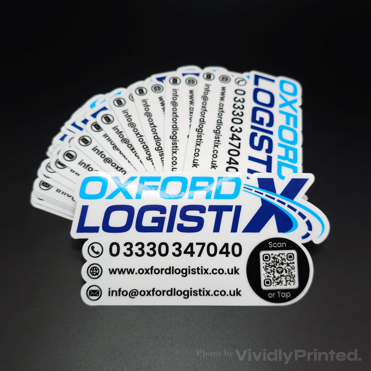 Oxford LogistiX business stickers with contact details and a QR code