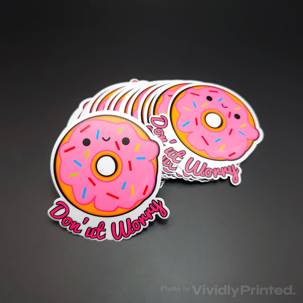 Die-cut pink doughnut stickers with sprinkles and Donut Worry lettering