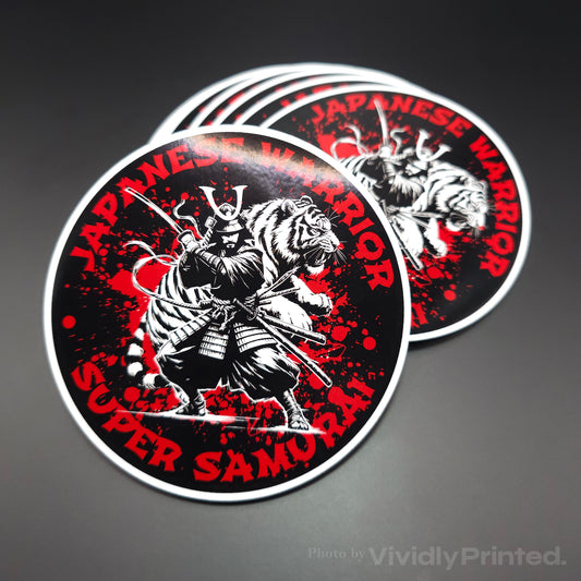 Round stickers with a red, black and white samurai warrior design