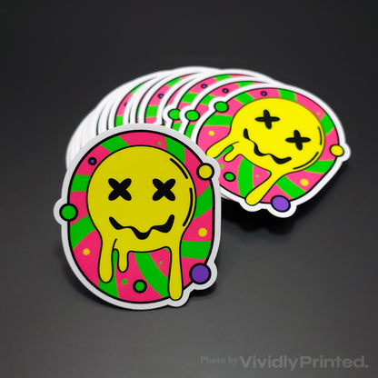Die-cut stickers with a melting yellow smiley face design